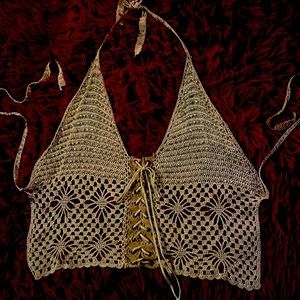 Small Gold crocheted halter worn once to the “Comstockrockmusicfestival”in 2002
